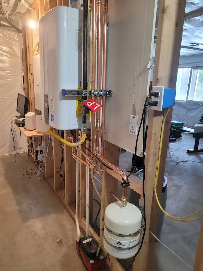 Licensed plumber repairing a kitchen sink in Moab